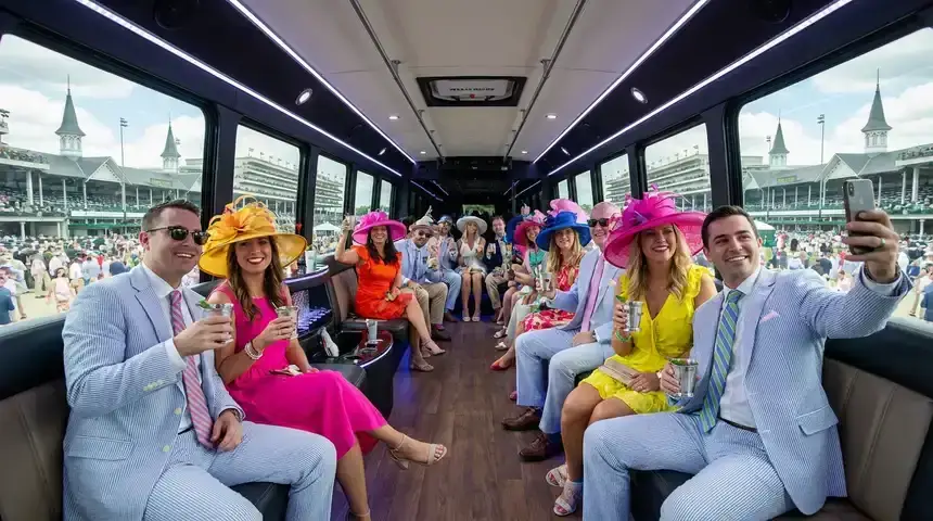 Group celebrating in a Kentucky Derby party bus
